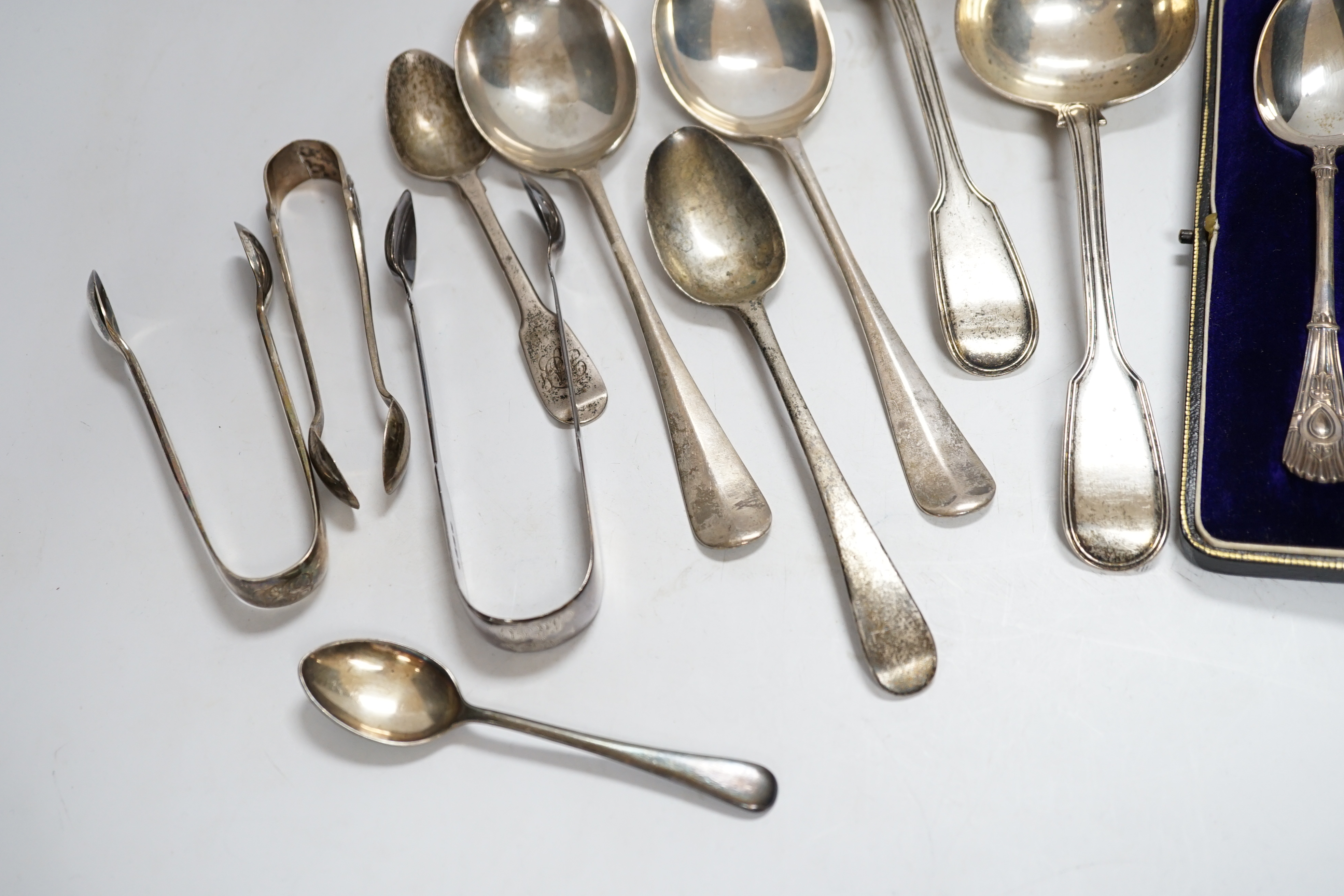 A small group of assorted silver flatware, including pair of fiddle and thread pattern sauce ladles, Elizabeth Eaton, London, 1848